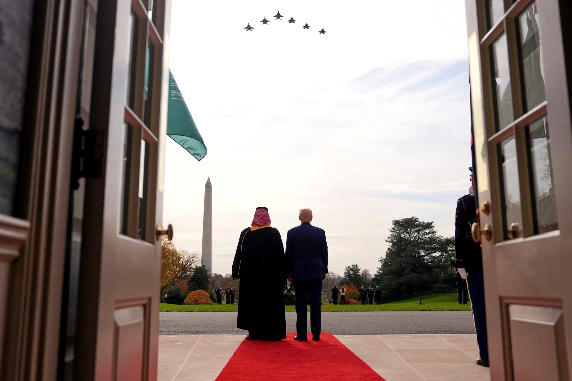 US President Donald Trump (right) and Saudi Arabia’s Crown Prince Mohammed bin Salman watch F-35 and F-15 fighter jets fly over during the welcome ceremony on the South Lawn of the White House on November 18, 2025, in Washington. Photo: AP/Evan Vucci